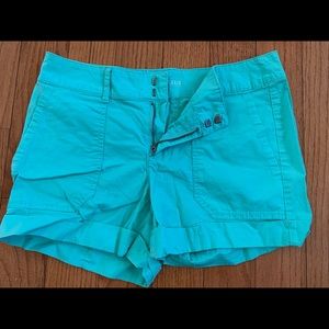 Green women’s shorts.